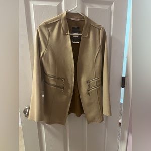 Women’s light brown leathery blazer/jacket